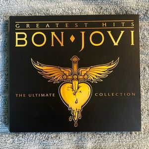 New, listened to once.Bon Jovi greatest hits